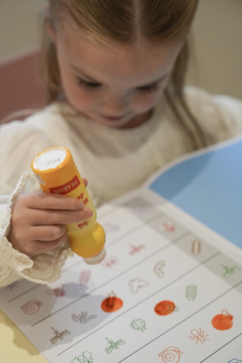 A young child enjoying an assessment activity at abc Child Psychology