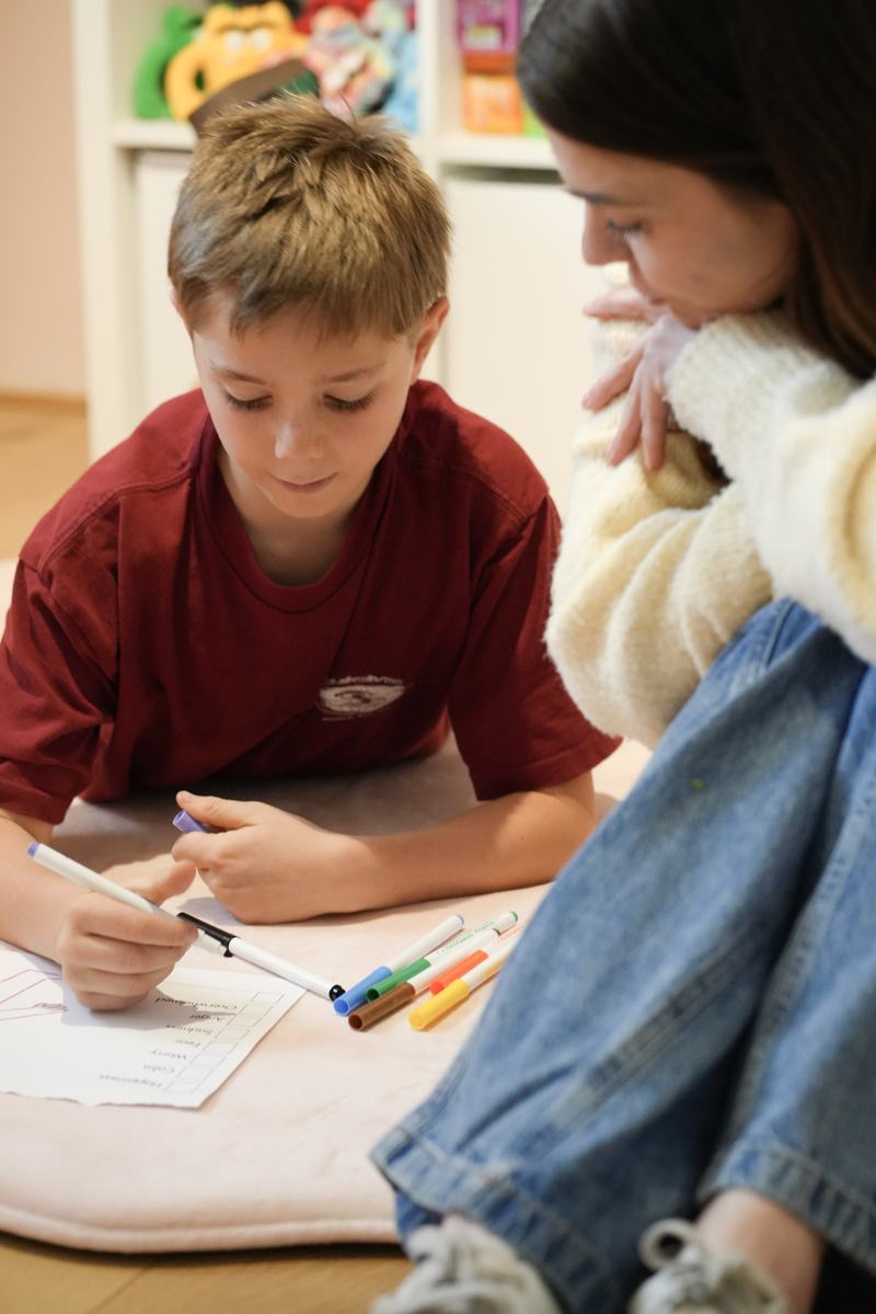 A child drawing during a therapy session at abc Child Psychology